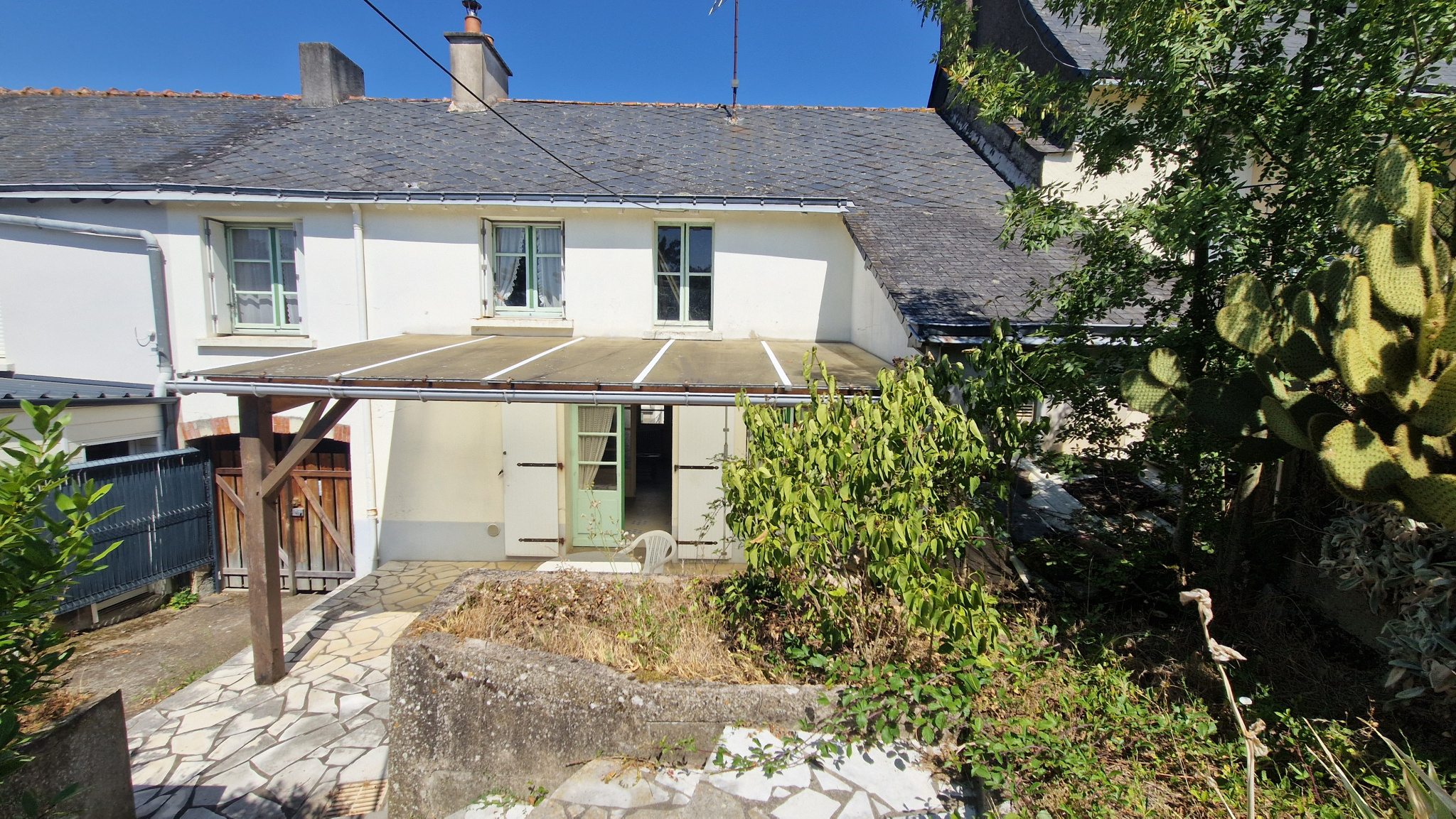 Maison de bourg avec jardin Fort potentiel d'aménagement !